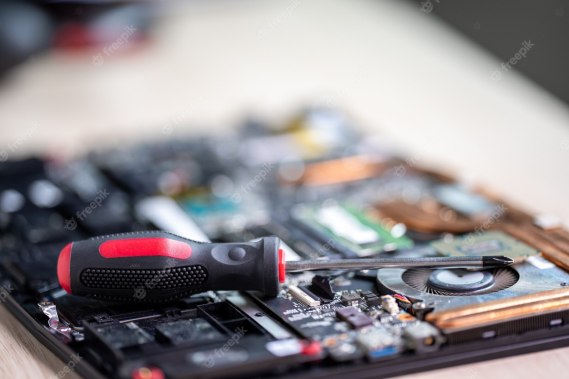 laptop-computer-being-repaired-computer-repair-service-hardware-support-electronic-technology_43157-2241